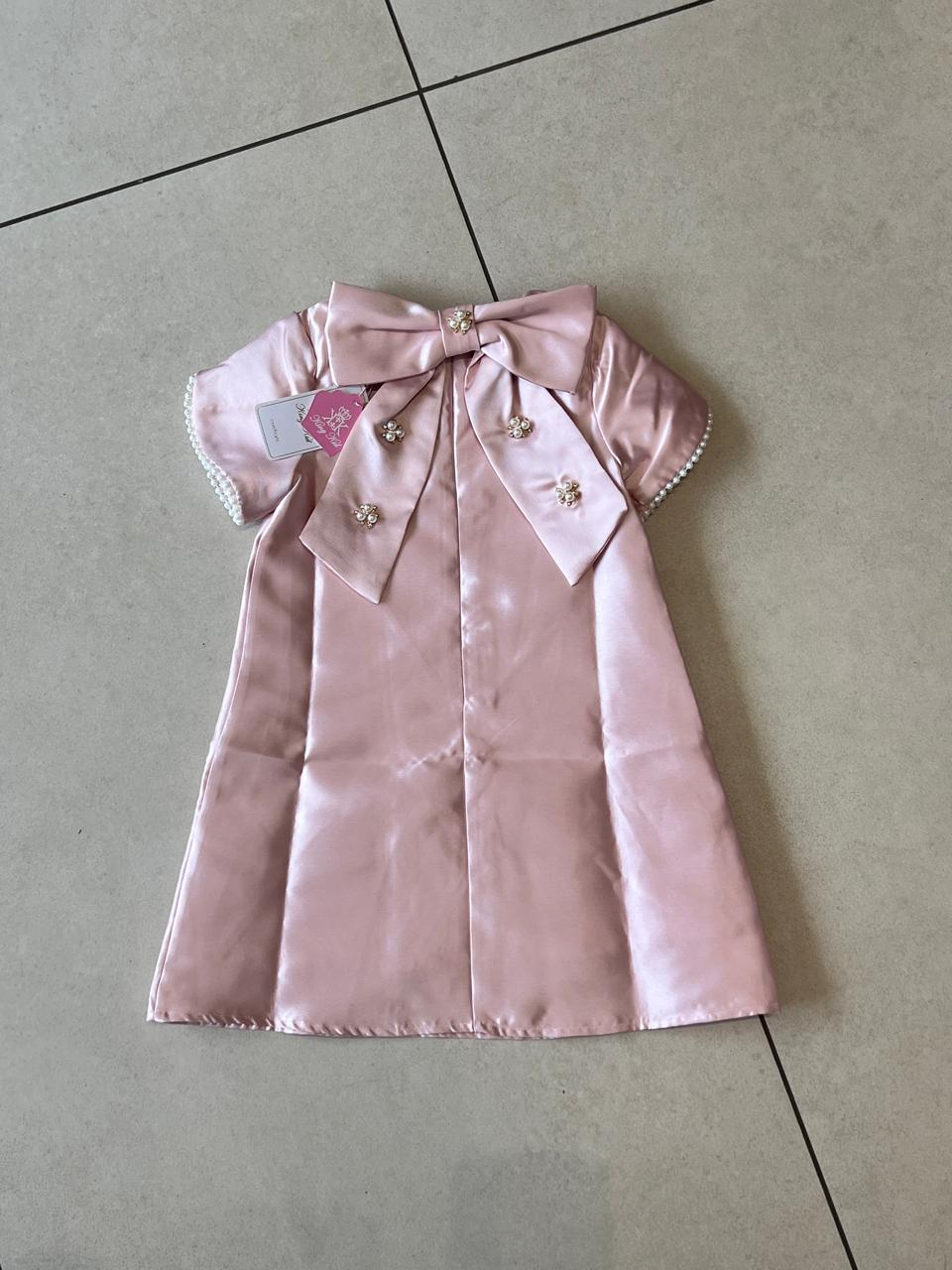 Pink Satin Dress with Oversized Bow & Pearl Sleeve Trim