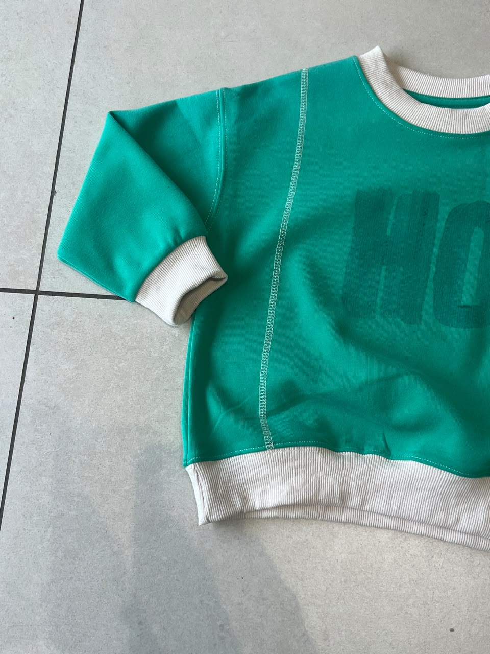 Kids Emerald Green Contrast Stitch Fleece Sweatshirt with Pocket | Ages 3–7, front view, aataa kidd