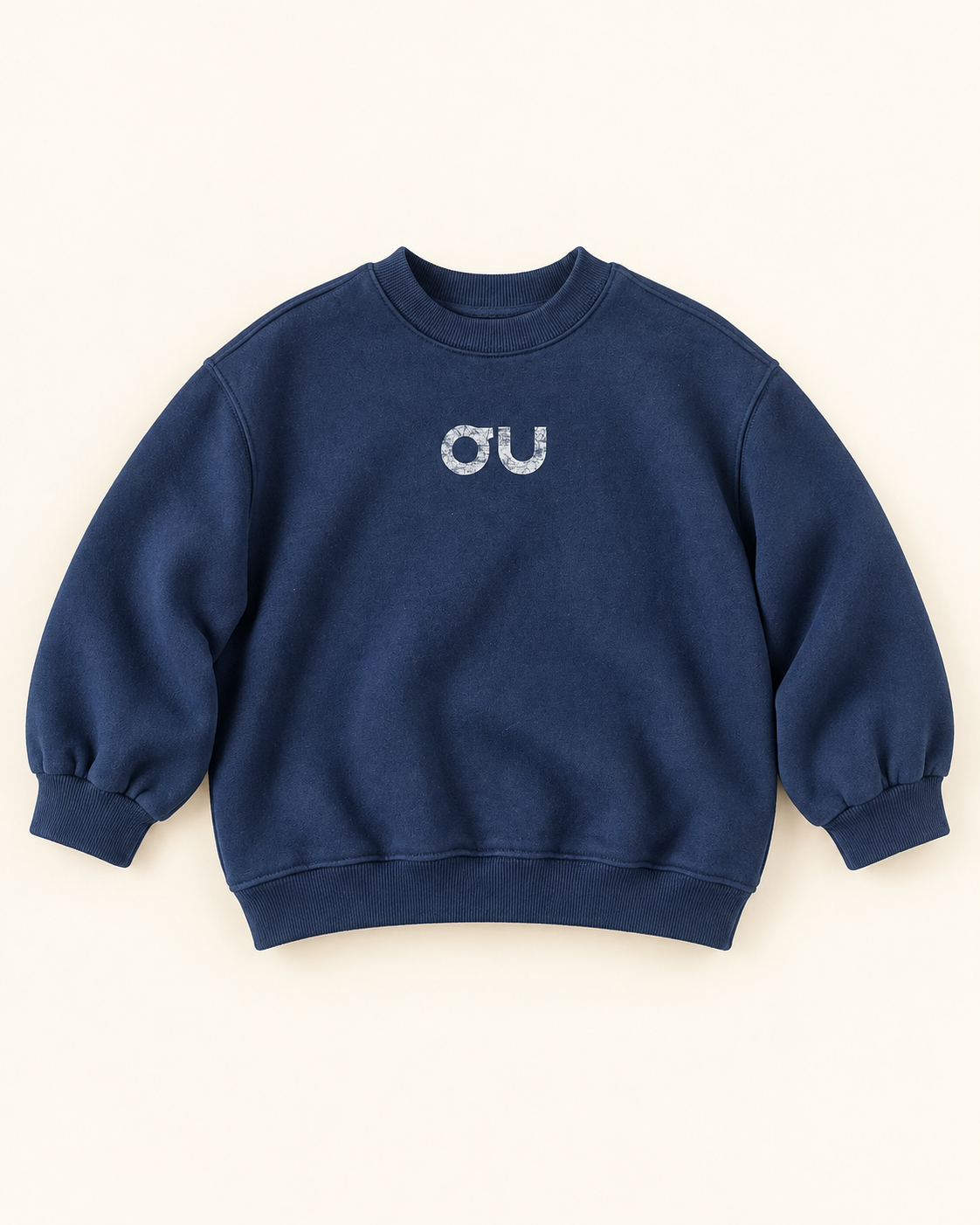 Navy OU sweatshirt for kids ages 3–7, cream studio flat lay front view, aataa kidd