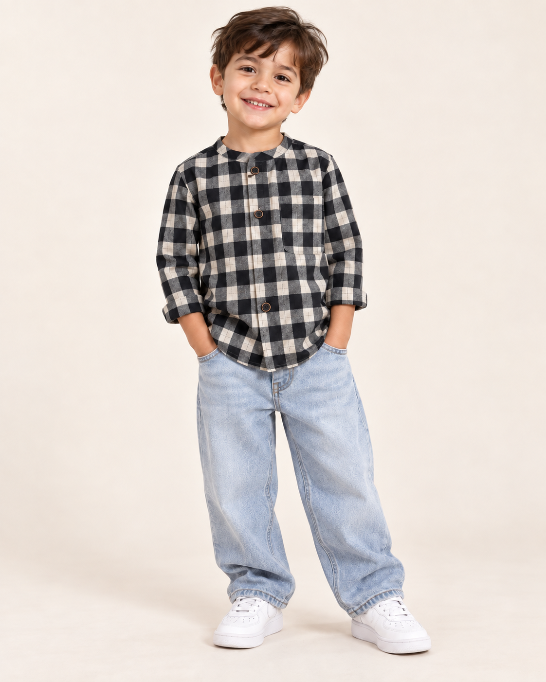 Boy wearing black, charcoal-grey and cream check band-collar shirt
