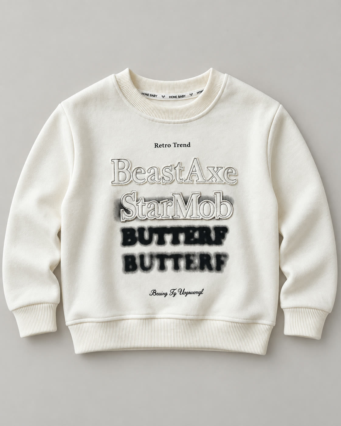 Cream long-sleeve graphic sweatshirt flat lay, product only