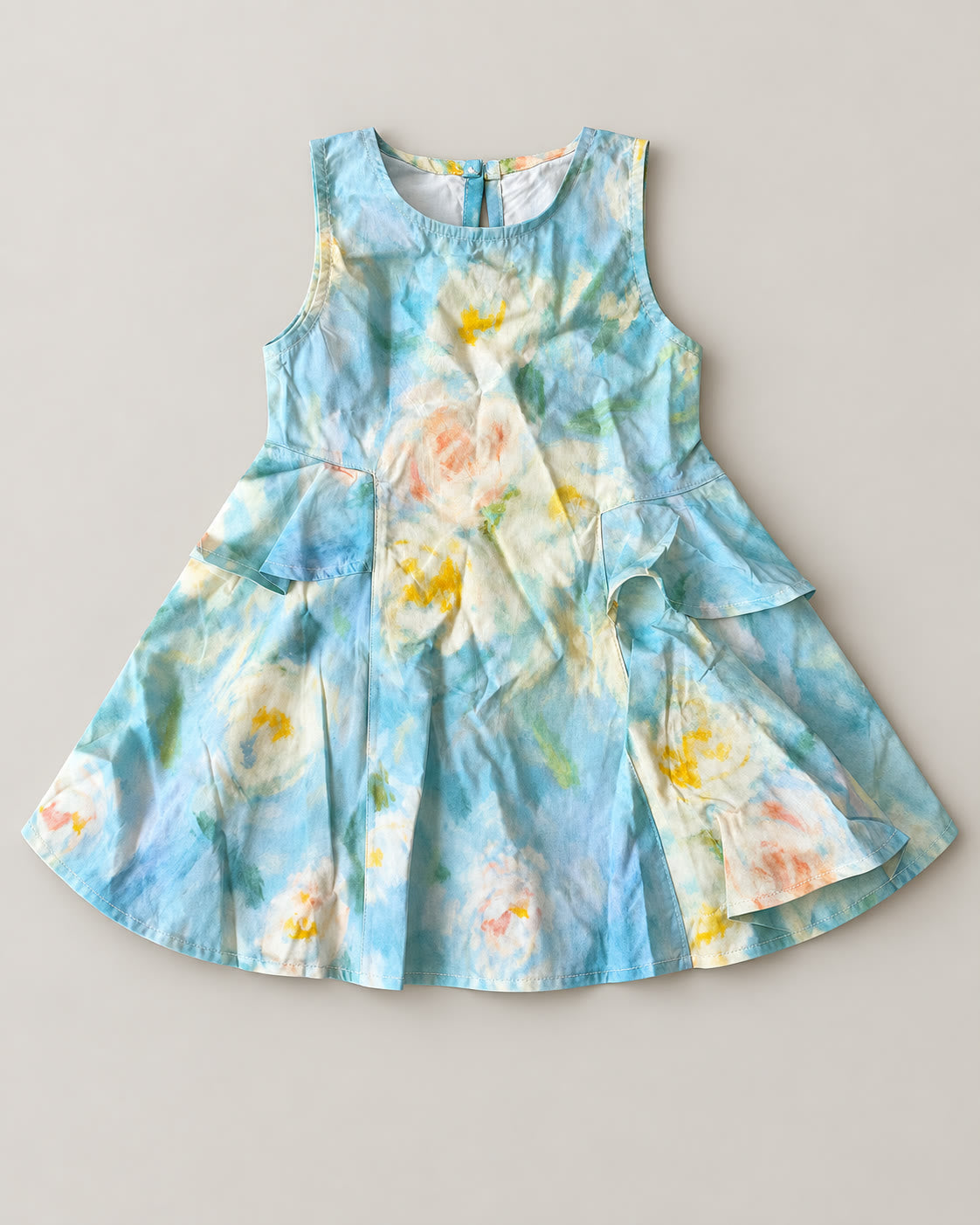 Aqua watercolor sleeveless tiered frock flat lay, dress only