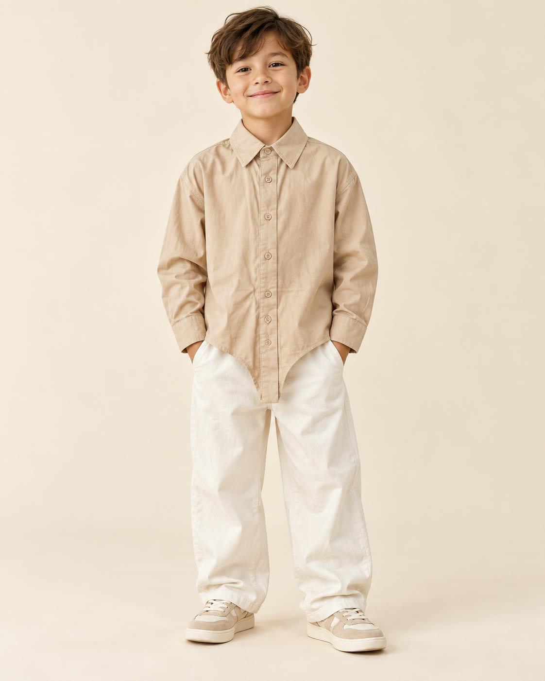 Boy wearing beige long-sleeve pointed-tail button-down shirt with loose ivory pants