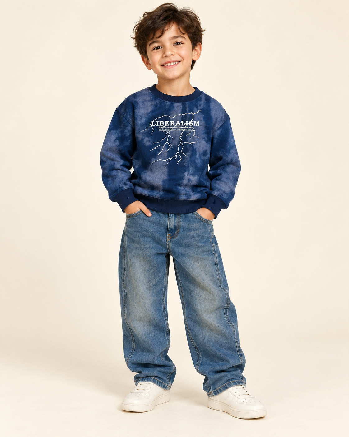 Boy wearing navy tie-dye LIBERALISM graphic sweatshirt
