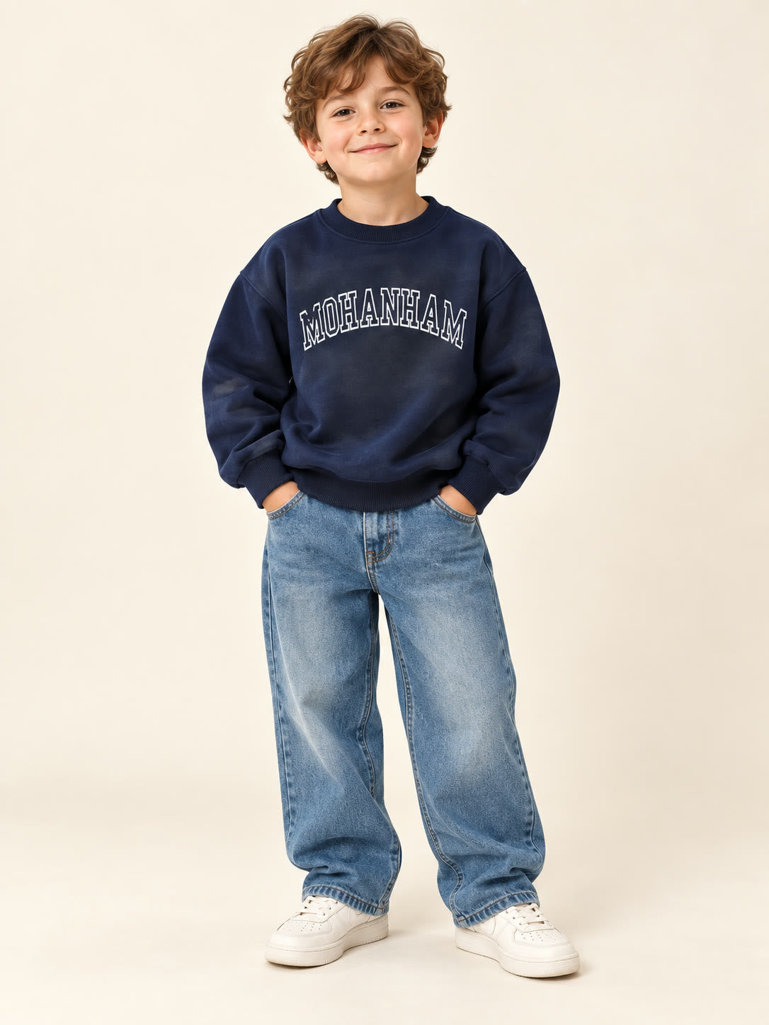 Boy wearing navy MOHANHAM sweatshirt